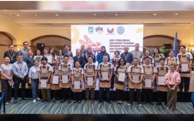 Graduates of the GSIS–TESDA Bread and Pastry Production training program receive certificates during the first batch completion ceremony in Davao.